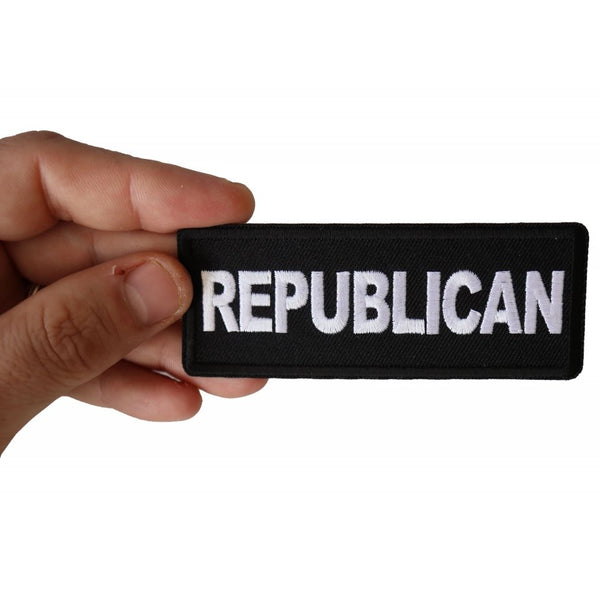 Republican patch held by a man's hand